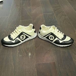 Men’s Gucci 8.5 Gucci size sneakers.  Lightly worn.